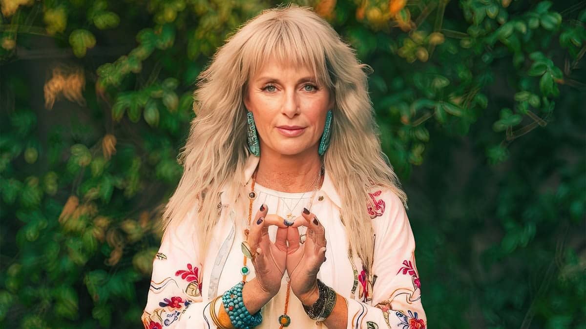 Melanie MataJi at The MataJi Sanctuary in Las Vegas, serene portrait among garden greenery